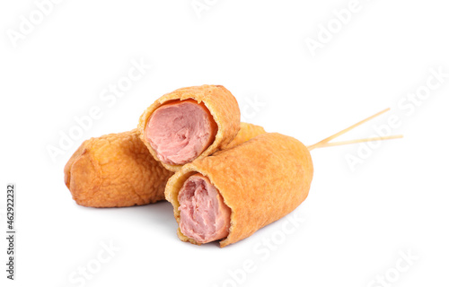 Canvas Print Delicious deep fried corn dogs on white background