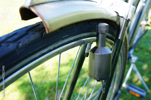 Closeup shot of a bicycle dynamo photo