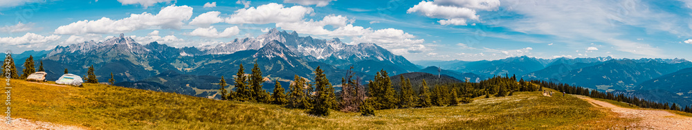 High resolution stitched panorama of a beautiful alpine summer view with the famous Bischofsmuetze and Dachstein summits seen from the Rossbrand summit near Filzmoos, Salzburg, Austria High resolution stitched panorama of a beautiful alpine summer view with the famous Bischofsmuetze and Dachstein summits seen from the Rossbrand summit near Filzmoos, Salzburg, Austria