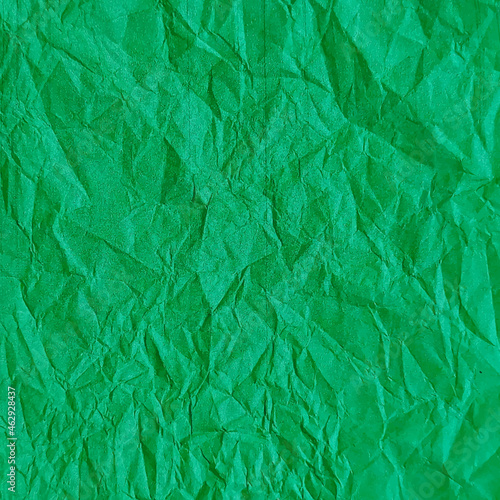 Realistic crumpled green paper texture background