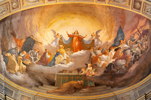 ROME, ITALY - AUGUST 27, 2021: The fresco of Assumption of Our Lady in the Vision of St Bonaventure in the church Chiesa di Santa Lucia del Gonfalone by Cesare Mariani (1863). photo