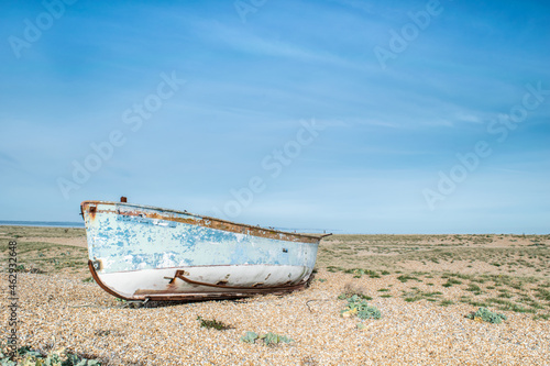 Abandoned woodenfishing boat wreck at the beach of Dungeness, Kent, England