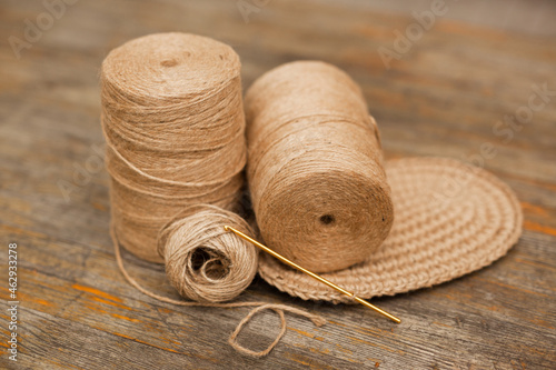 Natural jute thread for needlework. Materials for a knitted project. Women's hobby. Handicraft.