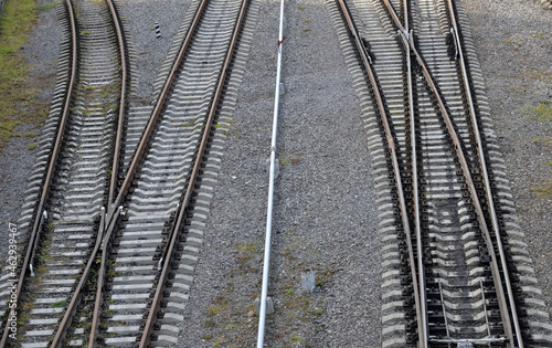 Four intersecting railway lines on gravel