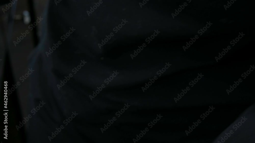 Makeup artist takes with special forceps false black long large fluffy artificial eyelashes in a special box with a professional makeup artist. Makeup artist takes with special forceps false black long large fluffy artificial eyelashes in a special box with a professional makeup artist.