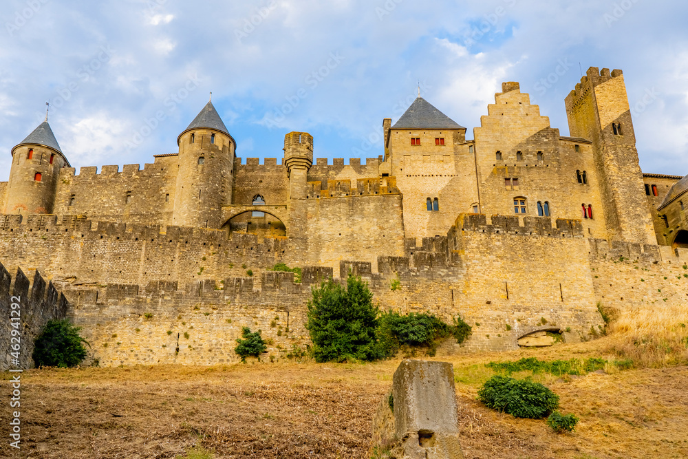 The Ancient Fortress of Carcassonne in the light of the setting sun. French Castle. High quality photo