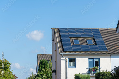 Wallpaper Mural roof of a house with solar panels or photovoltaic system, sun power plant Torontodigital.ca