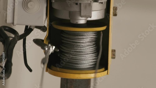 steel cable is wound on the winch spool. High quality FullHD footage photo