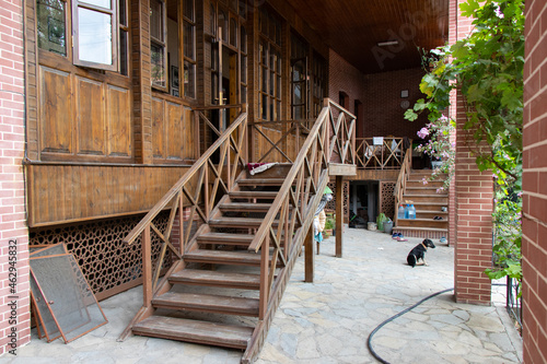 Wooden staircase and courtyard of home. The house where Nuri Pasha lived in Ganja in 1918 year. photo