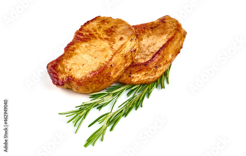Juicy roasted pork steaks, isolated on white background.