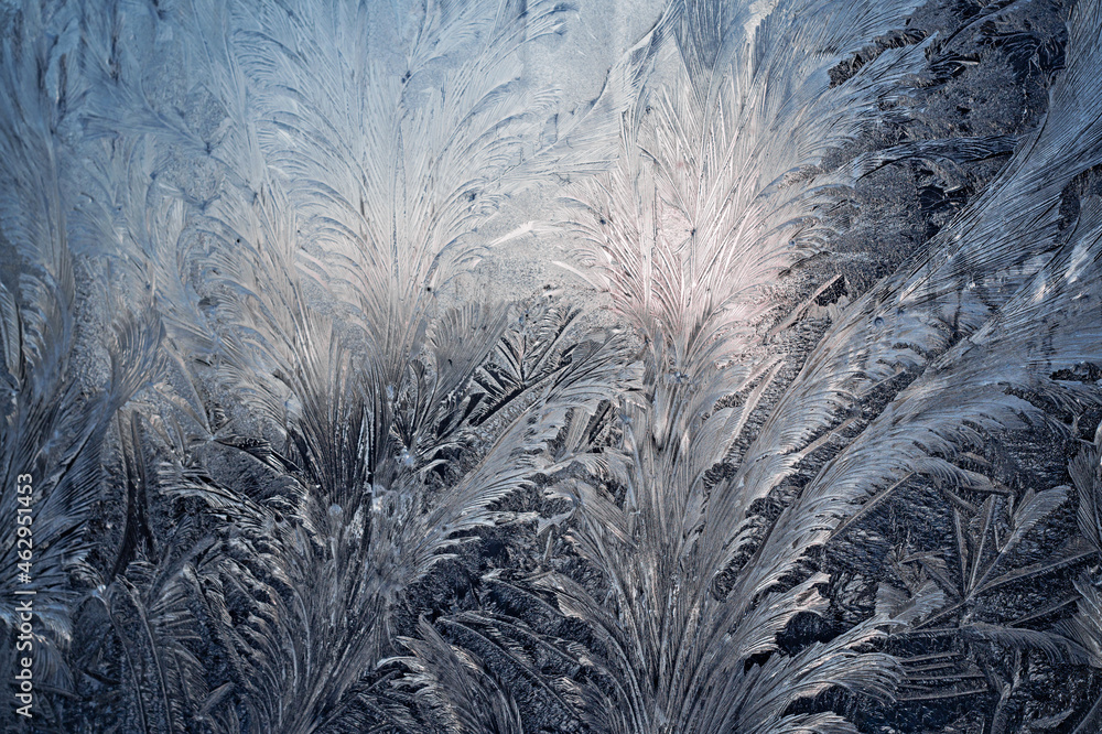 Winter pattern of frost on the window glass Winter pattern of frost on the window glass