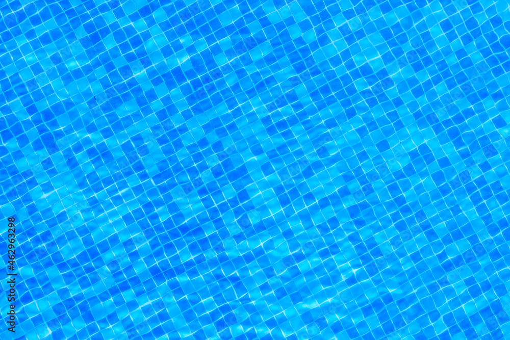 Background of the turquoise water in swimming pool Background of the turquoise water in swimming pool