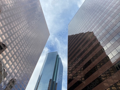 LOS ANGELES, CA, JAN 2021: Looking up at skyscrapers and reflections in Downtown Financial District on overcast day