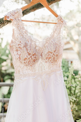 Wedding Dress - White tank top with white lace hanging from the tree, for the bride to wear during her beach wedding