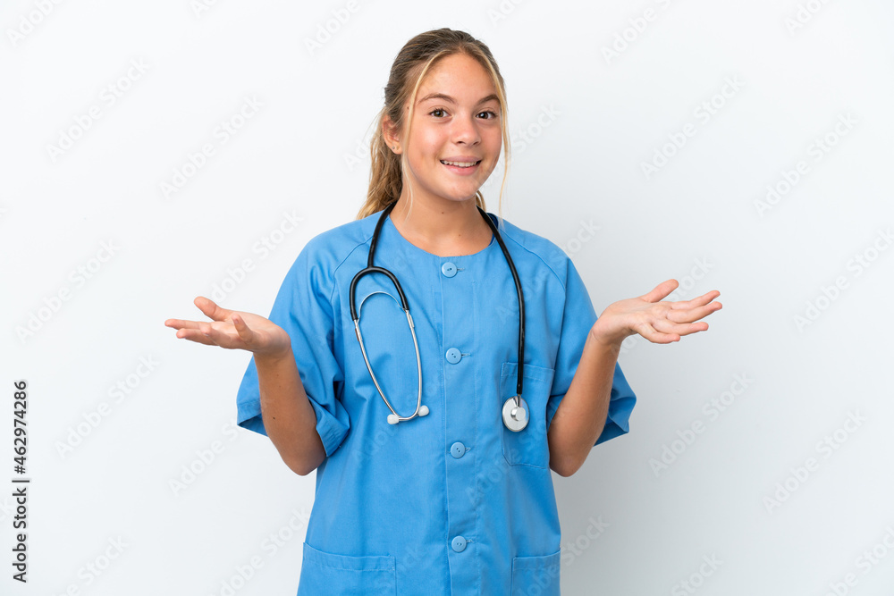 Little caucasian girl disguised as surgeon isolated on white background with shocked facial expression Little caucasian girl disguised as surgeon isolated on white background with shocked facial expression