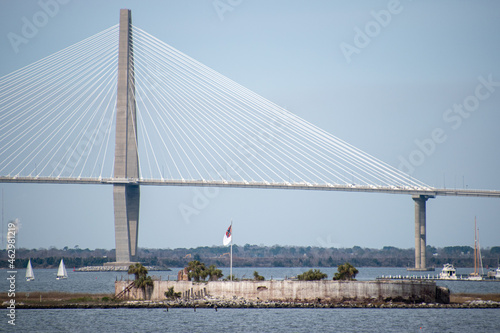 Castle Pinckney located in the Charleston Harbor with the Ravenel Bridge in the background photo