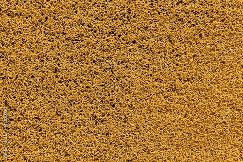 Brown plastic doormat texture and background seamless