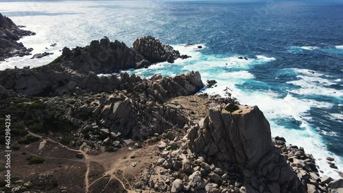 centuries shaped reef waves are broken by the unique rocky coast, island Capo Testa, Sardinia. bay was shaped by the water of the mediterranean sea and the wind. Drone, aerial view, Italy