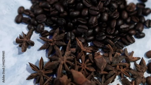 Wallpaper Mural Small piles of coffee beans and star anise seeds on white surface Torontodigital.ca