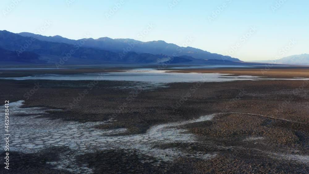 Birds eye view showing vast and endless salt pans on Badwater basin floor at Death Valley National Park. Birds eye view showing vast and endless salt pans on Badwater basin floor at Death Valley National Park.