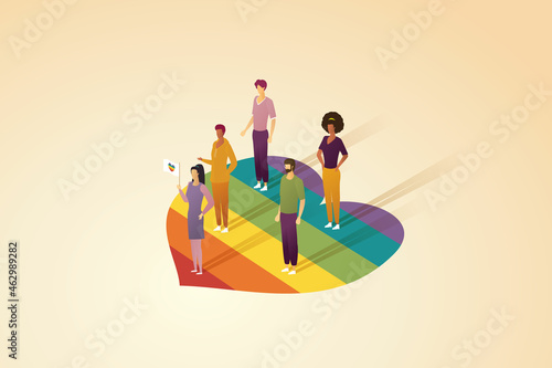 Group of people holding rainbow heart flags stand on rainbow big heart.