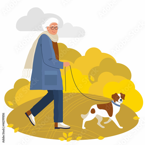 elderly woman walks with a dog