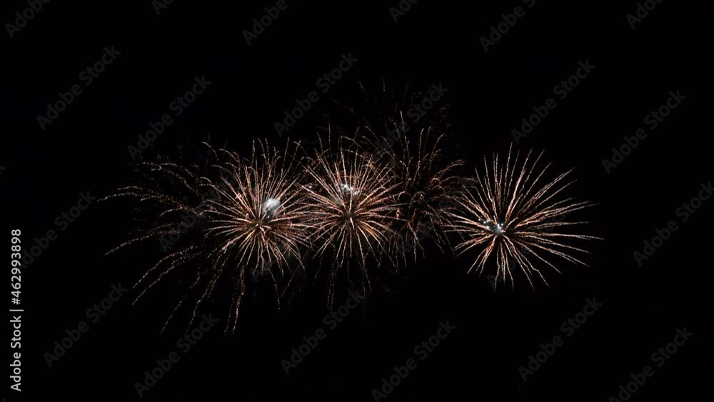 Loop seamless of real fireworks with abstract blur bokeh lights in night sky. Glowing fireworks festival. New year's eve 2022 fireworks celebration Loop seamless of real fireworks with abstract blur bokeh lights in night sky. Glowing fireworks festival. New year's eve 2022 fireworks celebration