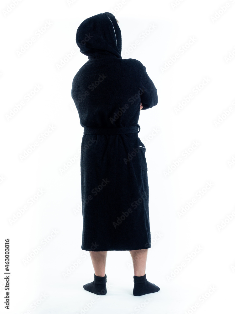 man in a Bathrobe from the back on an isolated white background.