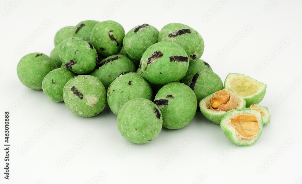 Group of wasabi coated roasted peanuts with a strong hot mustard horseradish flavour Group of wasabi coated roasted peanuts with a strong hot mustard horseradish flavour