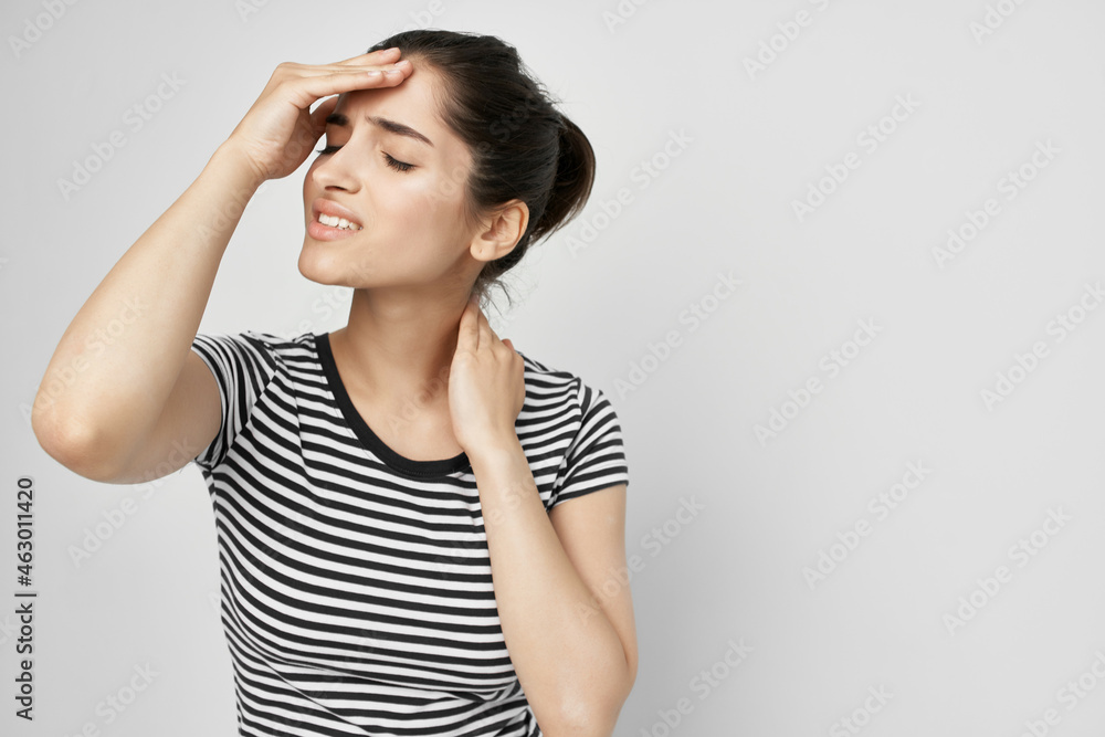 woman holding his head migraine depression light background woman holding his head migraine depression light background