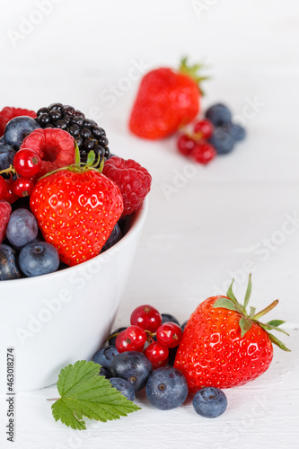 Berries fruits berry fruit strawberries strawberry blueberries blueberry on wooden board portrait format