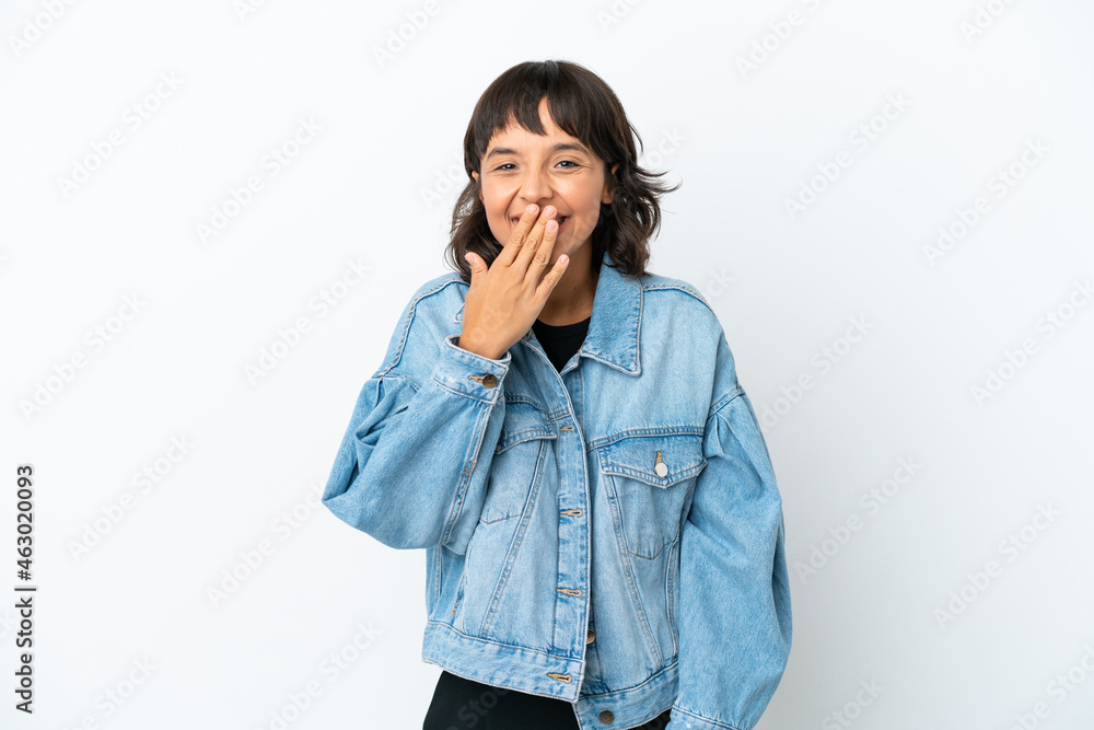 Young mixed race woman isolated on white background happy and smiling covering mouth with hand Young mixed race woman isolated on white background happy and smiling covering mouth with hand