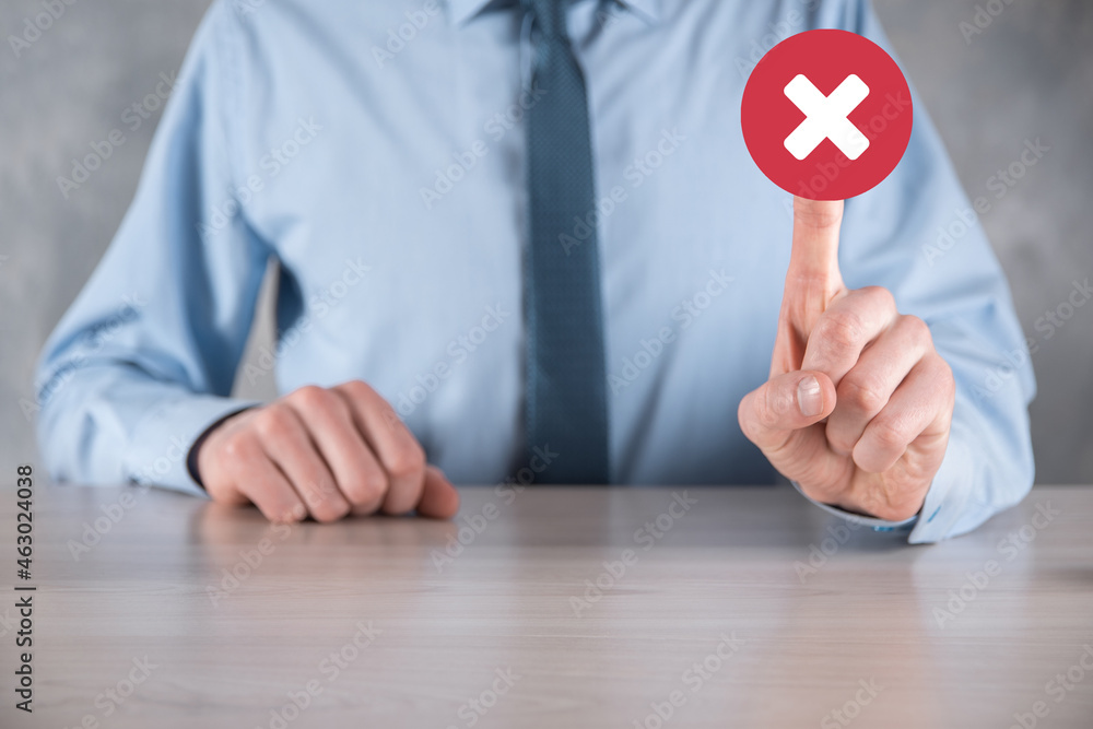 Hand holds icon,cancellation symbol,cancel icon.Cross mark flat red icon.round X mark.cancel button.Wrong.cross mark rejection.Declined.On dark background.Banner.Copy space.Place for text. Hand holds icon,cancellation symbol,cancel icon.Cross mark flat red icon.round X mark.cancel button.Wrong.cross mark rejection.Declined.On dark background.Banner.Copy space.Place for text.