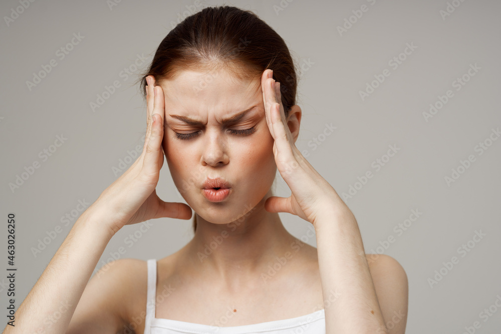 woman in white t-shirt depression symptoms headache studio treatment woman in white t-shirt depression symptoms headache studio treatment