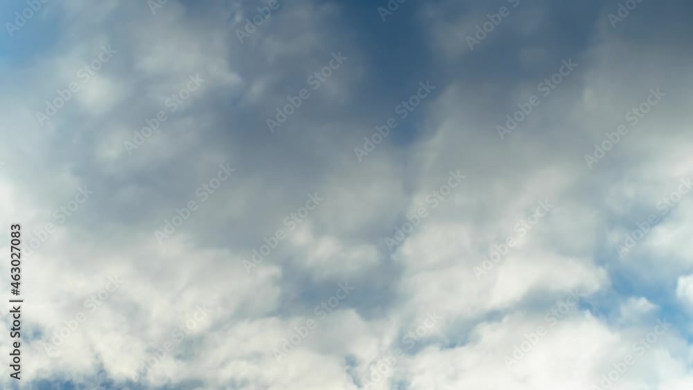 Timelapse white clouds in the air against a blue sky Timelapse white clouds in the air against a blue sky
