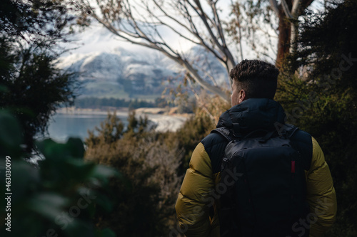 Wallpaper Mural Man with backpack walking among the forest Torontodigital.ca