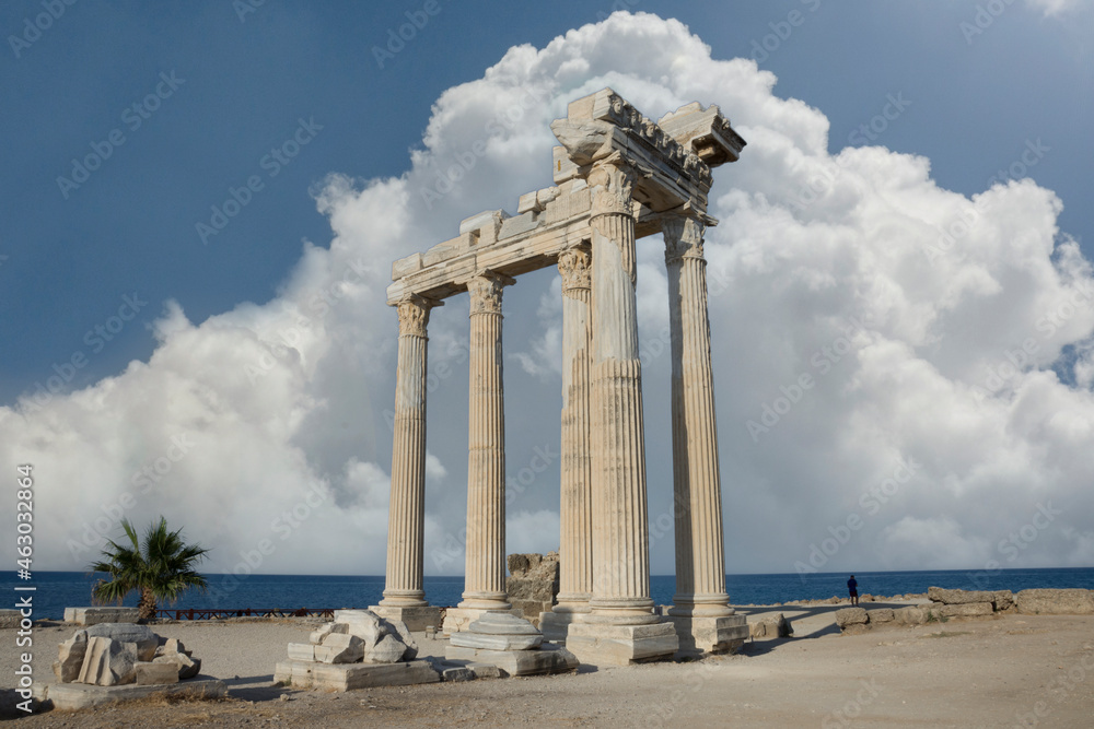 The Temple of Apollo is a Roman temple built around 150 A.D.  on the Mediterranean Sea coast.  Side Antalya Turkey. Cloudy Blue Sky. Selective Focus Columns.