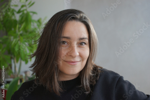 Portrait of a 39 years old woman with gray hair