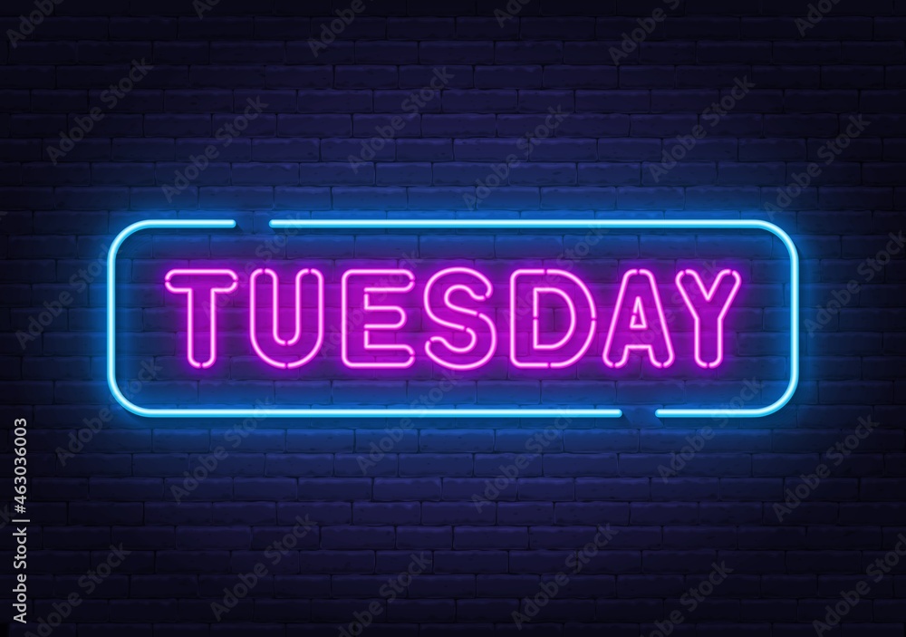 Obraz premium Tuesday neon sign on brick wall background.