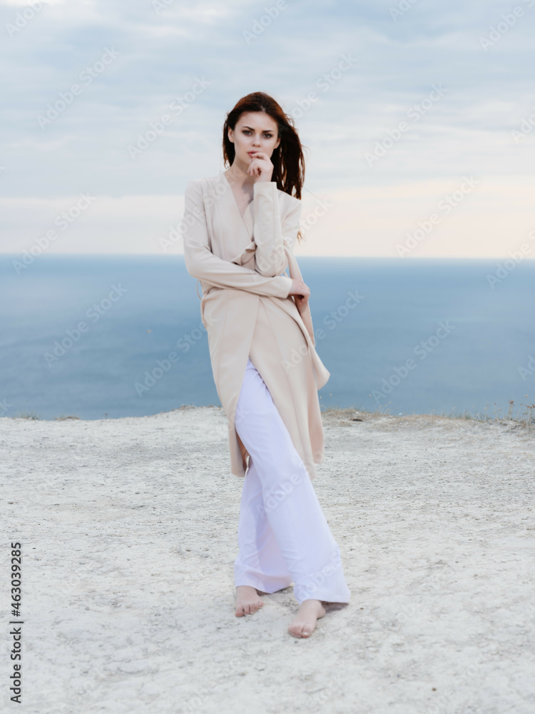 attractive woman walk along the beach sand tropics model Travel attractive woman walk along the beach sand tropics model Travel