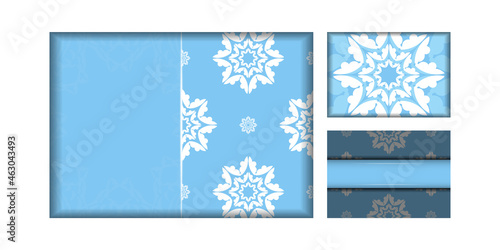 Postcard template in blue color with greek white pattern for your design.