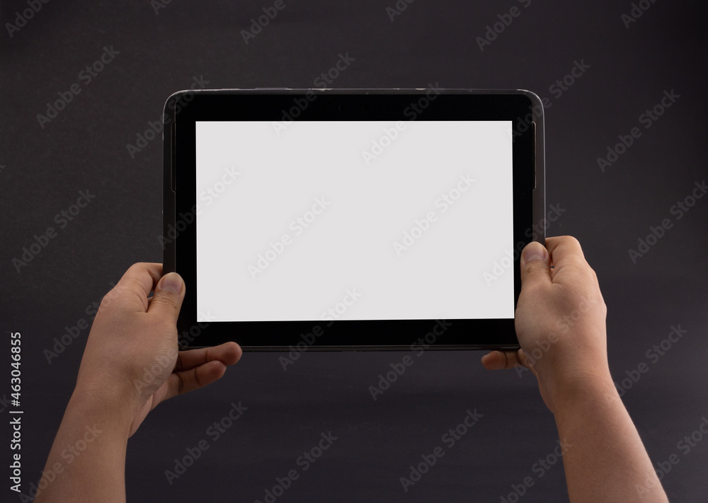 2 hand holding smartphone in horizontal isolated on black background. Customers can put ads, website pages or information that they want to be displayed on the phone screen. 2 hand holding smartphone in horizontal isolated on black background. Customers can put ads, website pages or information that they want to be displayed on the phone screen.
