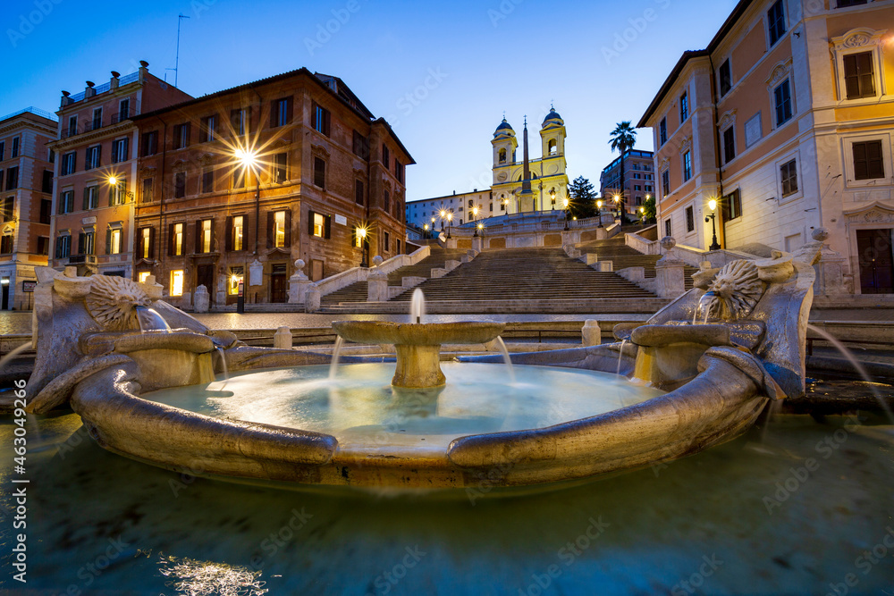 Naklejka premium The wonderful landscape that offers Piazza di Spagna in Rome with the famous staircase of Trinita dei monti and the fountain of the barcaccia