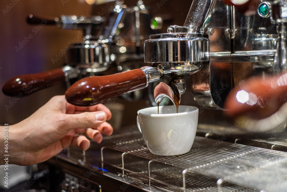 Making coffee. The professional coffee machines are usually going to be able to make a few cups of coffee at the same time. Making coffee. The professional coffee machines are usually going to be able to make a few cups of coffee at the same time.