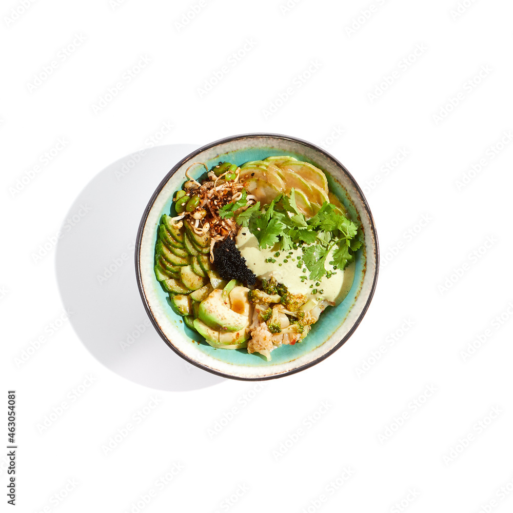 Vegan food - poke bowl with vegetables, edamame beans, soybean sprouts. Poke bowl with avocado and vegetables isolated on white background. Eat less meat. Plant - based eating.