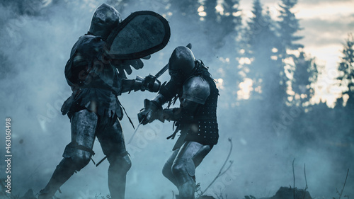 Dark Age Battlefield: Two Armored Medieval Knights Fighting with Swords. Battle of Armed Warrior Soldiers, Killing Enemy in Mysterious Forest. Cinematic Smoke, Mist, Light in Historic Reenactment