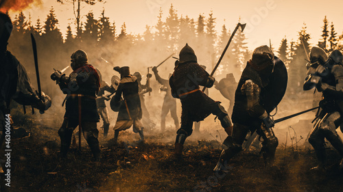Obraz na plátne Epic Battlefield: Two Armored Medieval Knights Fighting with Swords