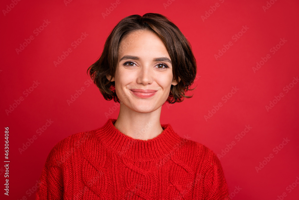 Photo of young attractive woman happy positive smile enjoy christmas time isolated over red color background Photo of young attractive woman happy positive smile enjoy christmas time isolated over red color background