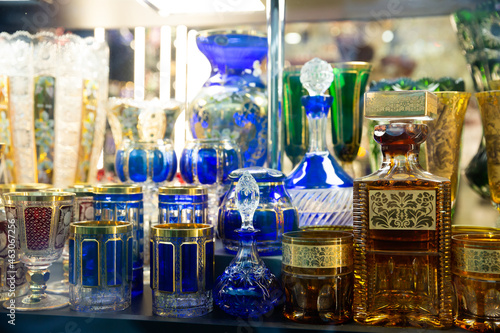 Original Bohemian glass products on counter in czech souvenir shop