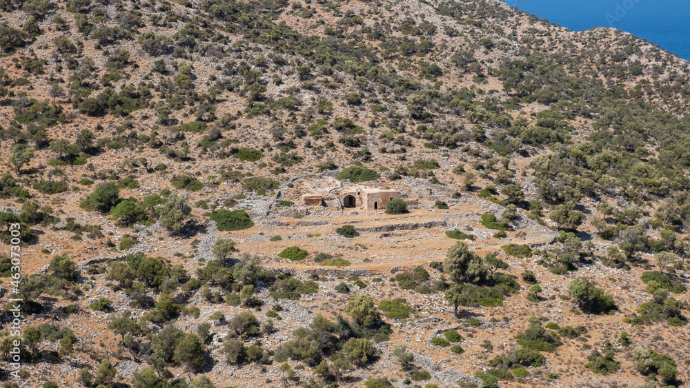 Old greek Ruins of a monastery in  Crete under sun
